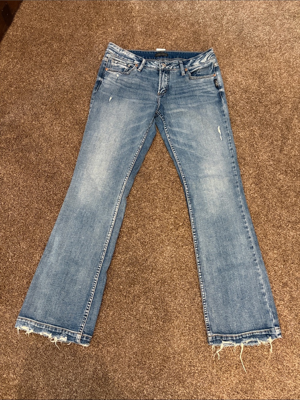 Silver Jeans Light Blue Flare Jeans with Frayed Hem